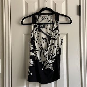 Black and white sleeveless top.